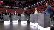 Arena-Moderator Sandro Brotz (Mitte) umgeben von Gregor Rutz, Zürcher SVP-Nationalrat, Melanie Racine, Vizepräsidentin Jungfreisinnige, Andrea Gmür-Schönenberger, Ständerätin «Die Mitte», und SP-Vizepräsident Jon Pult (v. l., Bild: SRF-Screenshot)